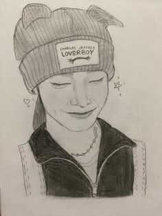 a drawing of a girl wearing a beanie with the words love story written on it