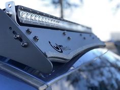 a close up of a car's license plate light