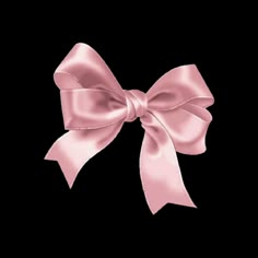 a pink bow on a black background