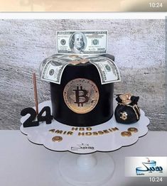 a cake made to look like a hat with money on top