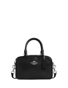 Patent leatherTwo credit card slotsZip closure, fabric liningHandles with 3 1/2" dropDetachable strap with 23" drop for shoulder or crossbody wear7 1/4" (L) x 5" (H) x 2 3/4" (W)Style No. CW190Color: Black Coach Satchel, Select Shop, Crossbody Bag Black, Black Cross Body Bag, Crossbody Bag, Satchel, Credit Card, Fabric, Black