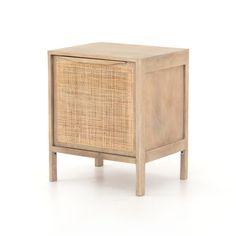 the side table is made out of wood and has a rattan pattern on it