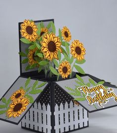 a pop up card with sunflowers on it