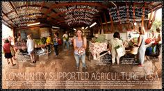 a group of people standing in front of a market