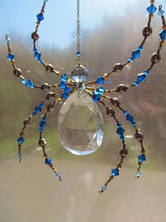 a spider made out of glass and beads