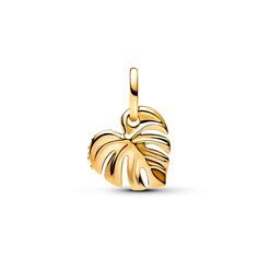 Wear an ode to nature with the Sparkling Monstera Leaf Dangle Charm. This 14k gold-plated leaf charm features one side covered in sparkling pavé, while the other side has realistic embellishments such as the ribs and veins found on real monstera leaves. The slitted details add to the charm's delicate and realistic look. For plant lovers who feel most at home among greenery, this golden-toned charm is a perfect gift or accessory. Pandora Gold Charms, Gold Pandora Charms, Cute Pandora Charms, Pandora Charms Gold, Pandora Wishlist, Luxury Wishlist, Charms Disney, Gold Pandora, Pearl Diamond Jewelry