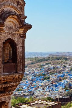 a view of the blue city from an old building