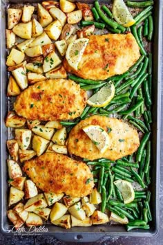 an image of chicken, potatoes and green beans on a sheet pan with the recipe below