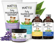 three bottles of nat's baby multipros diaper rash relief and one bottle of cough syrup