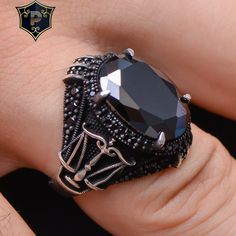 "Libra Mens Ring, Black Onyx Silver Ring, 925 Sterling Silver, Men Silver Jewelry, Stylish Rings, Handmade Ring, Solid Silver Ring, best Gift ✦ Details ✦ * Material: 925 Sterling Silver * Gemstone: Onyx  * Weight: 13.50 grams * The size of the stone: 13x18 mm. * Sides oxidized, decorated with Micro Zircon stones. * Stamp: 925 * Available sizes; 5 US to 16 US. Contact me if you need any other size! ✦ Shipping ✦ * Processing time: 1-3 business days. * This item ships from my Turkish workshop in Istanbul. * Add your phone number in address box for a smoother delivery. That makes courier personnel's job easier.  ✦ Packaging ✦ * Comes with a luxury gift box and a jewellery cleaning cloth and courtesy gift. ✦ Returns, Exchanges ✦ * Return option available for 30 days after the delivery. * The pr Men Silver Jewelry, Onyx Silver Ring, Mens Black Ring, Cool Rings For Men, Black Stone Ring, Rings Handmade, Sterling Silver Mens Rings, Stylish Rings, Mens Silver Rings