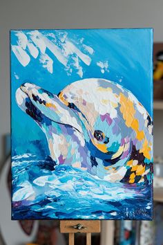 a painting of a sea lion on an easel