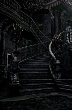 an image of a staircase with chandelier and lights in the dark night time