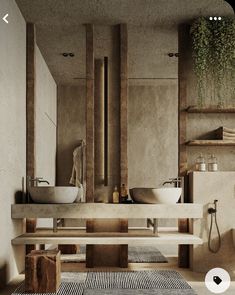 a bathroom with two sinks and a bench in front of the sink is made out of concrete