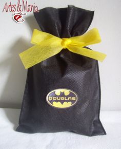 a black bag with a yellow ribbon on it