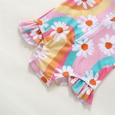 Get your little one ready for a day filled with splashes, giggles and unforgettable memories in this super cute and colorful floral swimsuit that will keep her protected and ready for a fun day at the pool or beach. Upf 50+ Swimwear For Beach Season Playtime, Playful Swimwear With Upf 50+ For Spring, Playful Swimwear With Upf 50+, Summer Beachwear Tankini For Playtime, Summer Beachwear Tankini, Playful Upf 50+ Swimwear For Spring, Cute Summer Swimwear For Sunbathing, Summer Swimwear With Upf 50+ For Playtime, Upf 50+ Swimwear For Summer Playtime