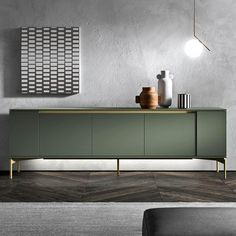 a modern sideboard with two vases on it