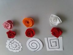 paper flowers are laid out on a table