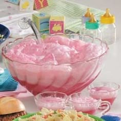 a table topped with plates and bowls filled with food