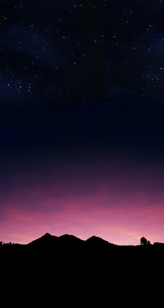 the sky is purple and blue with some stars above it, as well as mountains