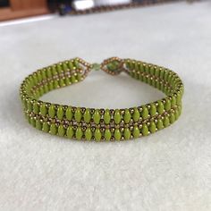 Beautifully Handmade! Opaque Chartreuse Green Superduo Beads With Bronze Seed Beads 8mm Swarovski Bead Loop Closure Can Customize To Any Size Wrist ***Message Me Prior To Purchase With Wrist Size Firm Price Gold Popcorn, Superduo Bracelet, Halloween Charm Bracelet, Rose Gold Bangle Bracelet, Geometric Bangle, Blue Crystal Bracelet, Faux Pearl Bracelet, Twisted Bracelet, Chartreuse Green