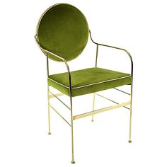 a green chair sitting on top of a metal frame