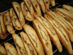 some food is cooling on a rack and ready to be cooked in the oven for consumption