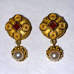 14 Kt. Solid Gold Earrings. Byzantine Style With Center Garnet And Pearl Drop. 1.25” Drop. Substantial Weight At 15 Grams. A Stunning Piece Of Jewelry. Yellow Gold Earrings With Historical Design As Gift, Elegant Yellow Gold Earrings With Historical Design, Formal Byzantine Round Earrings, Byzantine Yellow Gold Ceremonial Earrings, Ceremonial Byzantine Jewelry With Matching Earrings, 22k Gold Byzantine Jewelry For Formal Occasions, Byzantine Jewelry With Matching Earrings For Anniversary, Formal 22k Gold Byzantine Jewelry, Hallmarked Byzantine Jewelry For Formal Occasions