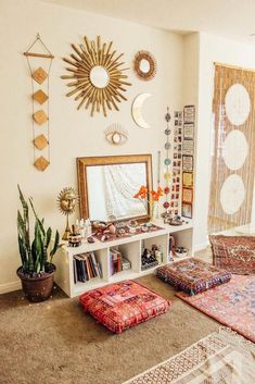 a living room filled with lots of furniture and decor on top of carpeted flooring