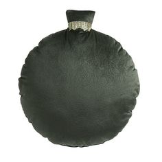 a black round pillow with a silver ring on it's end, sitting in front of a white background