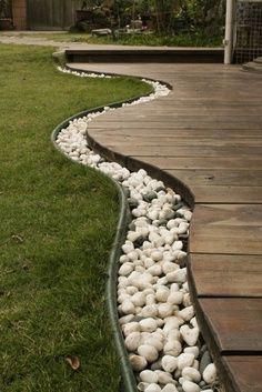 an image of a garden path made out of rocks and stones with the words 51 budget backyard diy's that are bor