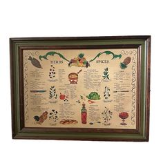 a framed poster with the words herbs and spices on it's side, hanging in a wooden frame