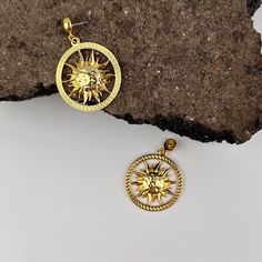 The Bold Sun Stud Earrings are a stunning accessory that captures the essence of sunlight with their large, radiant design. Plated in 24K gold, these Celestial Earrings are perfect for adding a touch of elegance to any outfit. The shining sun motif makes them an eye-catching statement piece, ideal for both everyday wear and special occasions. These earrings make a thoughtful gift for her--perfect for birthdays, anniversaries, or any celebration. Whether for a mother, sister, best friend, or girlfriend, these earrings are a beautiful way to brighten up her jewelry collection. Features. -Manual assembly Anti-allergenic metal alloy, does not contain nickel and tin -Process of coating: electrophoresis -Coating: 24K gold or 925 silver, jewelry ceramics  1 year warranty on the coating  EARRINGS Sun Motif, Sun Earrings, Celestial Earrings, Thoughtful Gifts For Her, Long Chain Necklace, Jewelry For Her, Earrings Statement, Large Earrings, Matching Necklaces