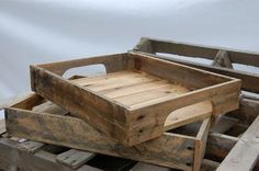 two wooden crates sitting on top of each other