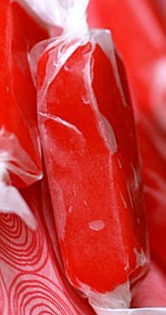 some candy is wrapped in plastic and sitting on a table