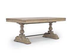 an old wooden table with two pedestals on each side and one leg missing the top