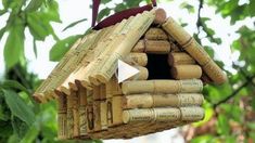 a bird house made out of wine corks