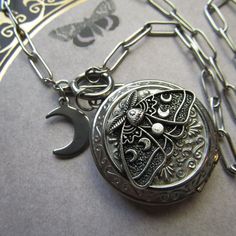 Fully Stainless Steel Piece Except The Moth Deign On The Face Of The Locket. Chain And Locket Are Both Stainless Message For Custom Requests Prior To Purchasing, Thanks! Spooky Neighborhood, Moth Photo, Swamp Witch, Locket Chain, Lunar Moth, Gothic Glam, Silver Locket Necklace, The Moth, Long Statement Necklace