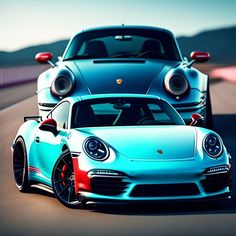 two blue sports cars driving on a race track with mountains in the background at sunset