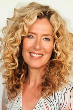 31 Chic Curly Hairstyles For Women Over 50 For A Style Refresh - The Hairstyle Edit Medium Length Haircut With Layers For Women Over 50, Short Wavy Hairstyles For Women, Long Natural Curls, Edgy Short Haircuts, Short Curly Hairstyles For Women, Natural Curly Hair Cuts, Bob Haircut Curly, Hairstyles For Women Over 50, Blonde Curls