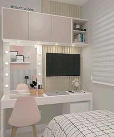 a bedroom with a bed, desk and mirror