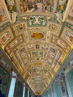 an ornate ceiling with paintings on it