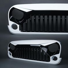 the front and rear grilles of a white car with black accents on grey background