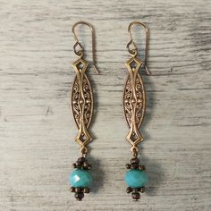 Elegant Patina Earrings, Elegant Turquoise Metal Chandelier Earrings, Elegant Green Patina Earrings, Bronze Patina Earrings, Elegant Adjustable Jewelry With Patina, Adjustable Elegant Jewelry With Patina Detail, Elegant Turquoise Brass Jewelry, Turquoise Dangle Brass Earrings, Turquoise Dangle Earrings In Brass