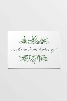 the welcome to our wedding sign is shown in green and white with leaves on it