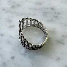 Beautifully detailed silver gothic gate ring. This ring is adjustable. Adjustable Silver Gothic Rings, Gothic Style Nickel Free Metal Rings, Gothic Style Nickel-free Metal Rings, Nickel Free Gothic Metal Rings, Nickel-free Gothic Metal Rings, Gothic Silver Metal Rings, Gothic Metal Rings With Oxidized Finish, Gothic Silver Rings With Intricate Design, Gothic Rings With Oxidized Metal Finish