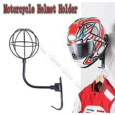 motorcycle helmet holder on the wall next to a bike helmet hanger and jacket rack