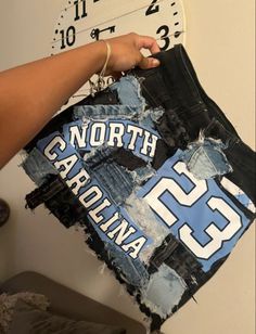 Outfits To Wear To Football Games, Football Gameday Outfit Black Women, Sgrho Homecoming Outfits, Senior Jersey Ideas, Senior Denim Jeans, Senior Jean Shorts Painted, Custom College Painted Jeans, Football Game Fits College, Customized Birthday Shorts