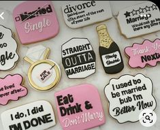 decorated cookies with different sayings on them for wedding guests to eat and have their names cut out