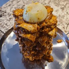 a stack of food sitting on top of a plate