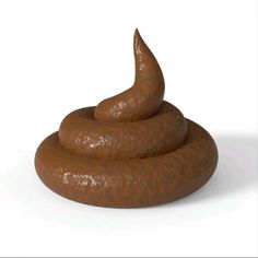 a chocolate donut sitting on top of it's side in front of a white background